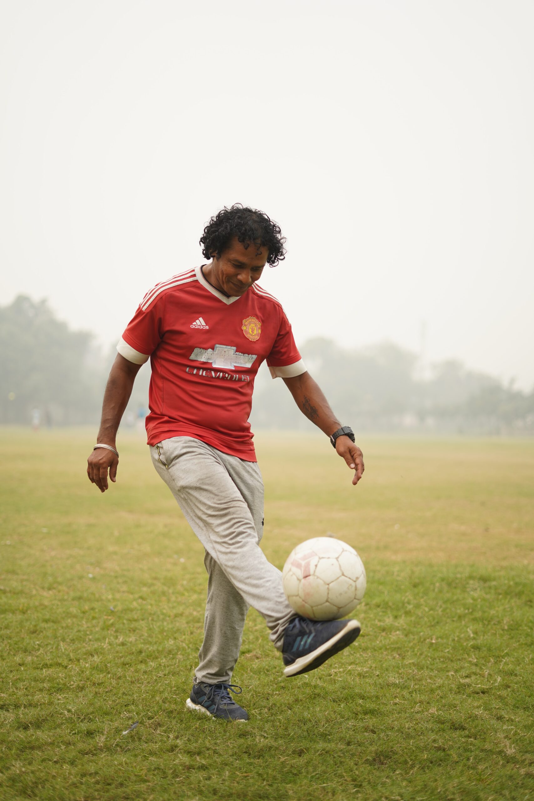 stock image guy playing soccer